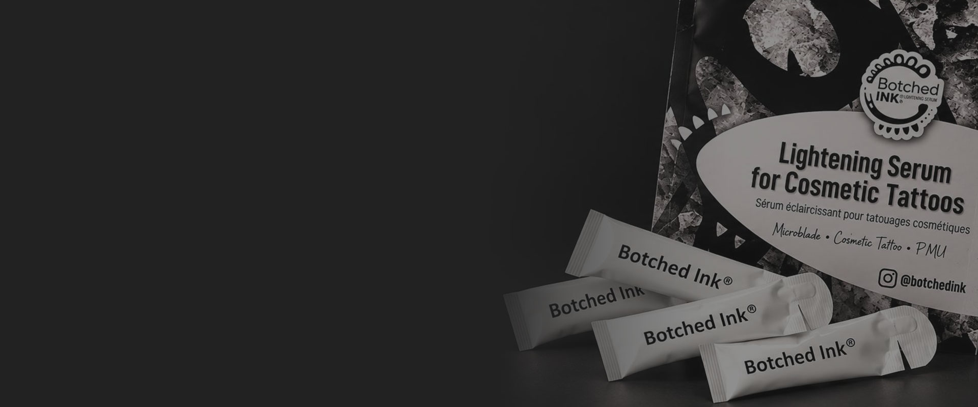 Botched Ink PMU Removal in Madison and Huntsville Alabama Botched Ink pigment lightening serum packaging and single-use sachets on a dark background